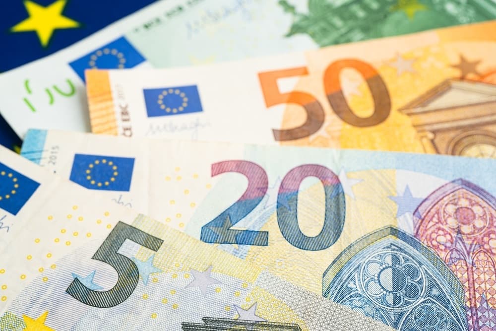 Euro banknotes fanned out on a table