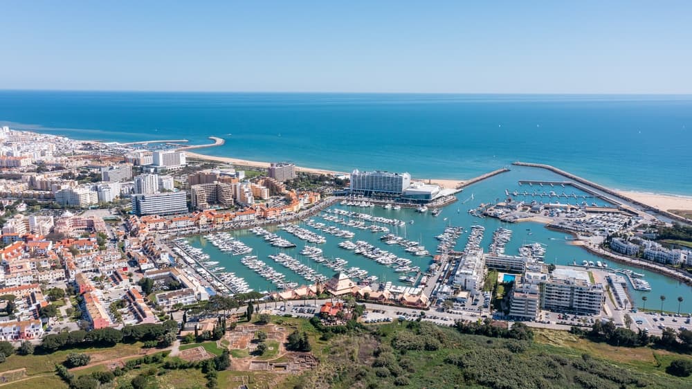 Aerial view of marina in Vilamoura on bright summer day, Algarve