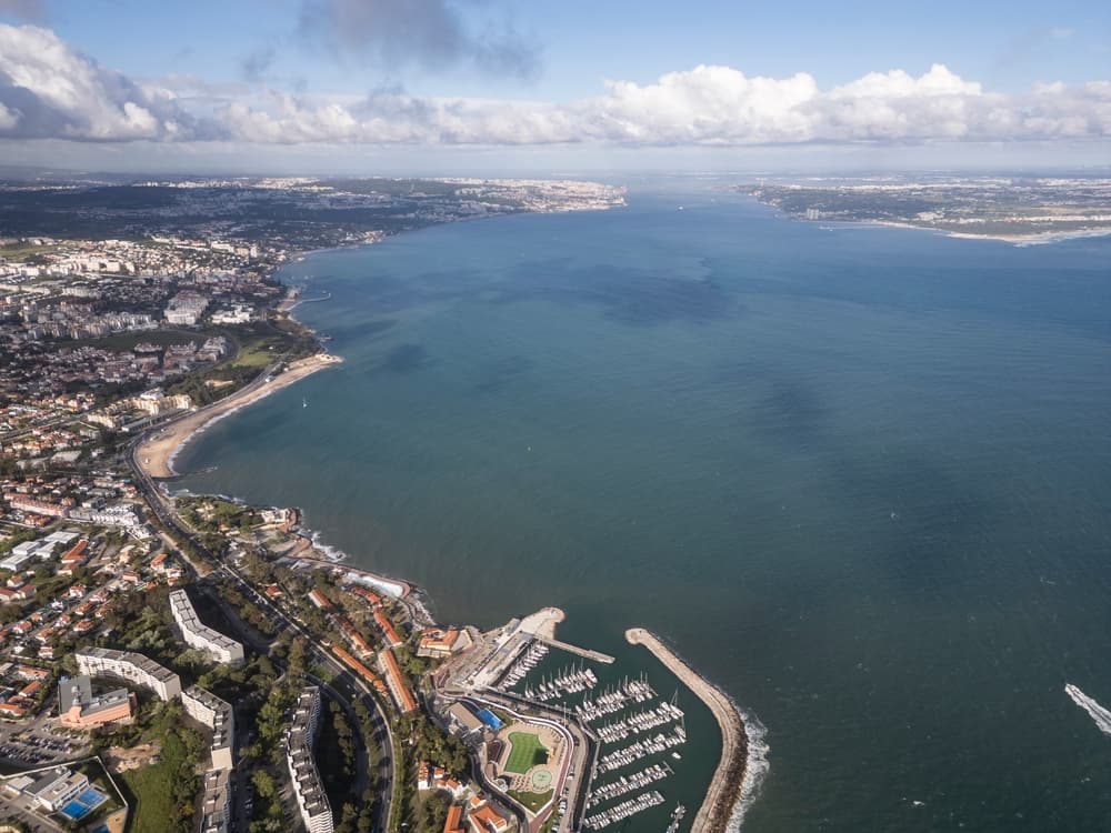 Aerial view of old fortress and town on the coast, Carcavelos