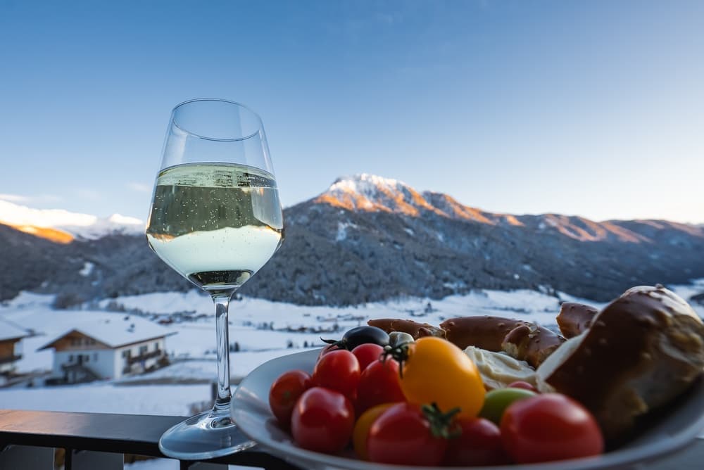 Late afternoon sunlit with wine and tomatoes, Dolomites
