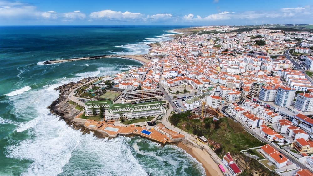 Aerial view of the city with red tiles and white houses, Ericeira