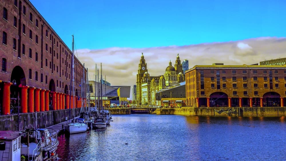 UK Albert Dock with small motorboats moored at shore, Liverpool