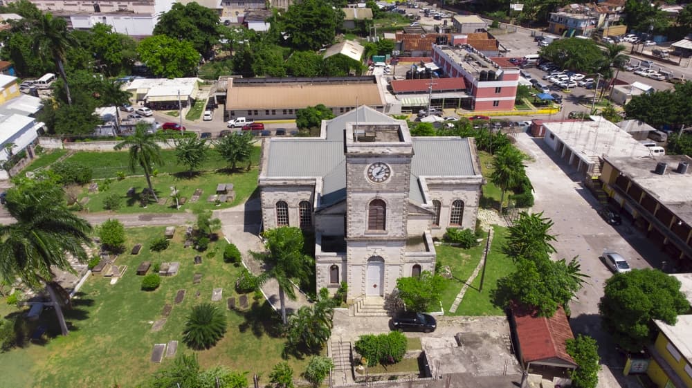 Drone shot of local church and clock tower, Montego Bay