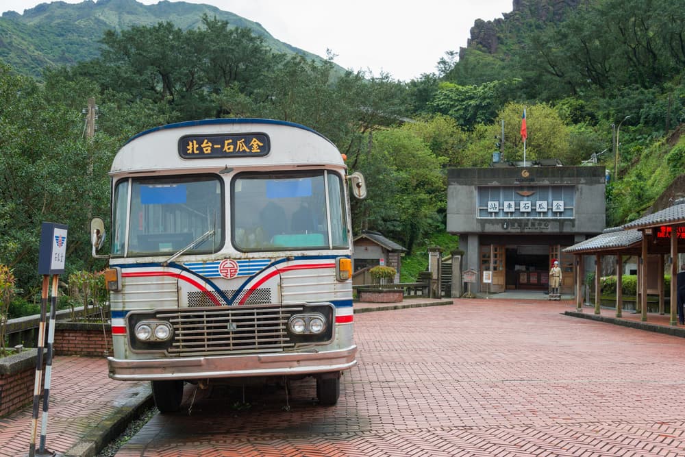 Bus waits for passengers at edge of jungle, New Taipei City