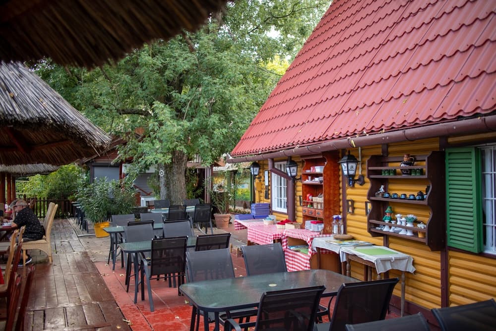 Local restaurant ready to serve outdoor patrons, Pécs