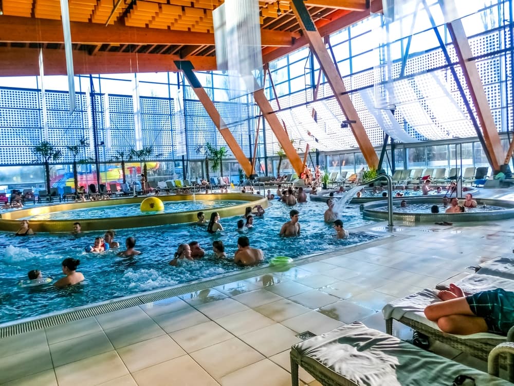 Families enjoy indoor aquatics at local pool, Poprad