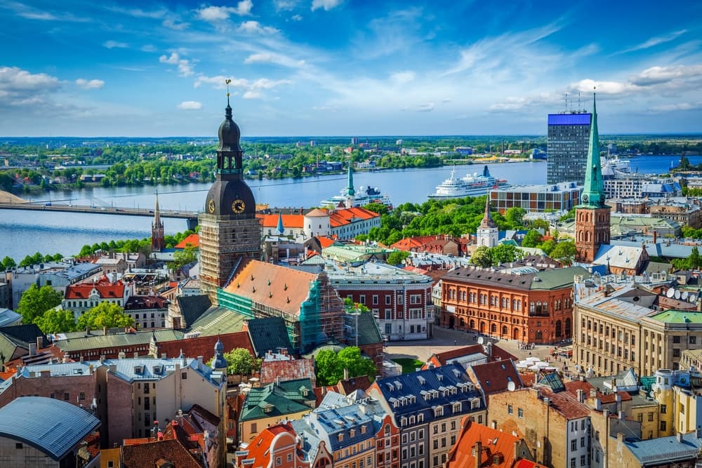 Aerial view of colorful city and clock tower, Riga