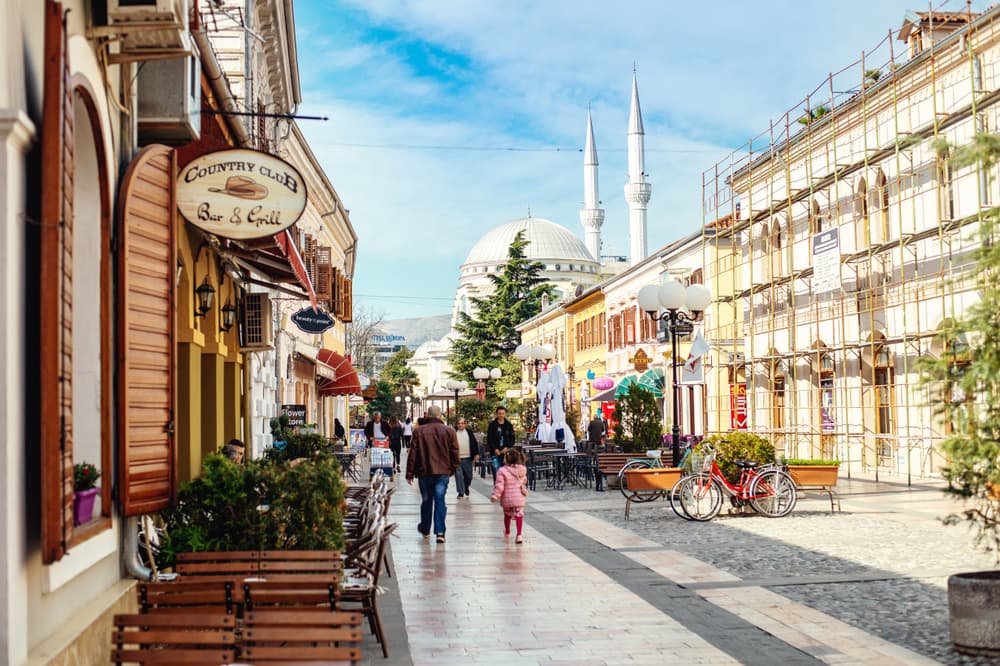 Albana locals stroll along city center street, Shkodër