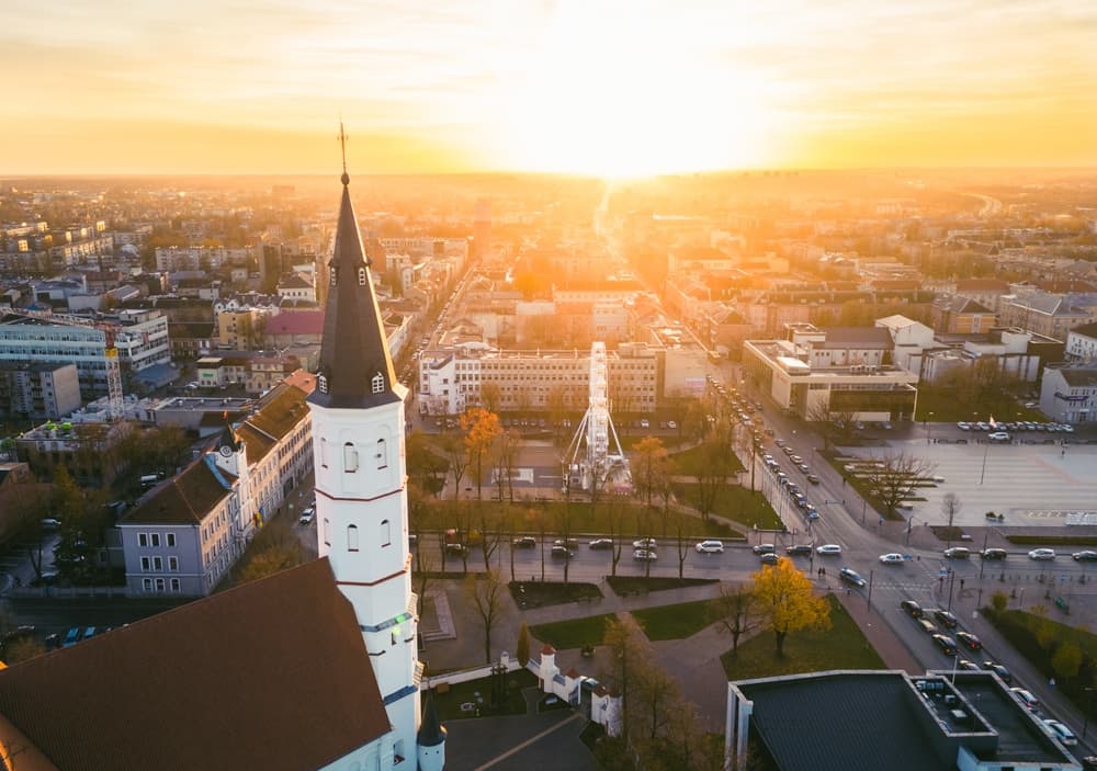 Aerial panorama of cityscape by thin tower, Šiauliai