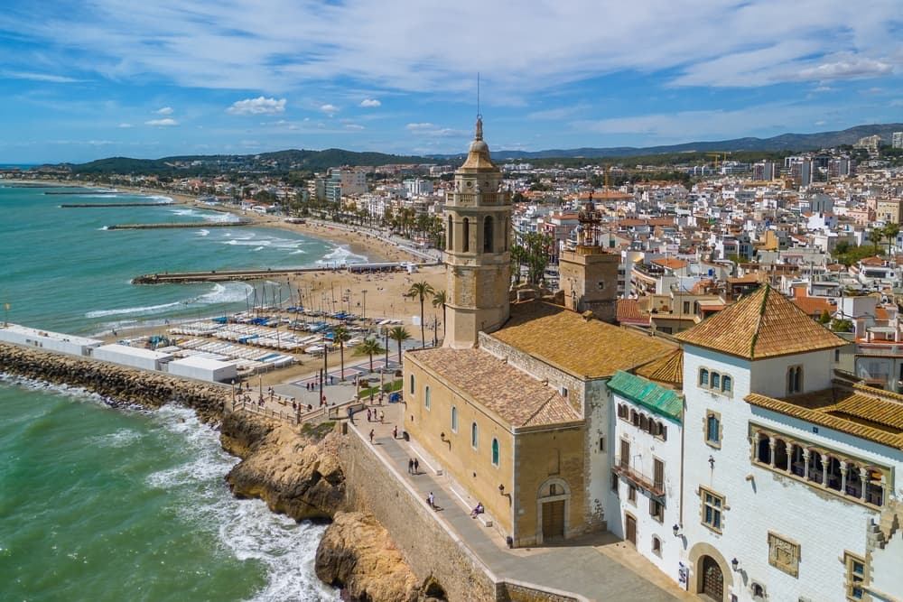 Aerial view of coastline and narrow road alongside it, Sitges