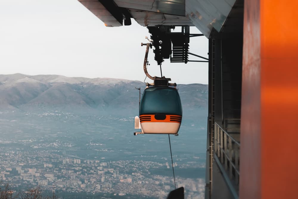 Cable car prepares to descend mountain into city, Skopje