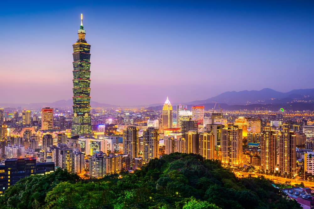 City cityscape and tower lit up for early evening, Taipei