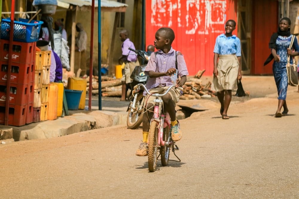 Kids on bicycles in the street, Takoradi