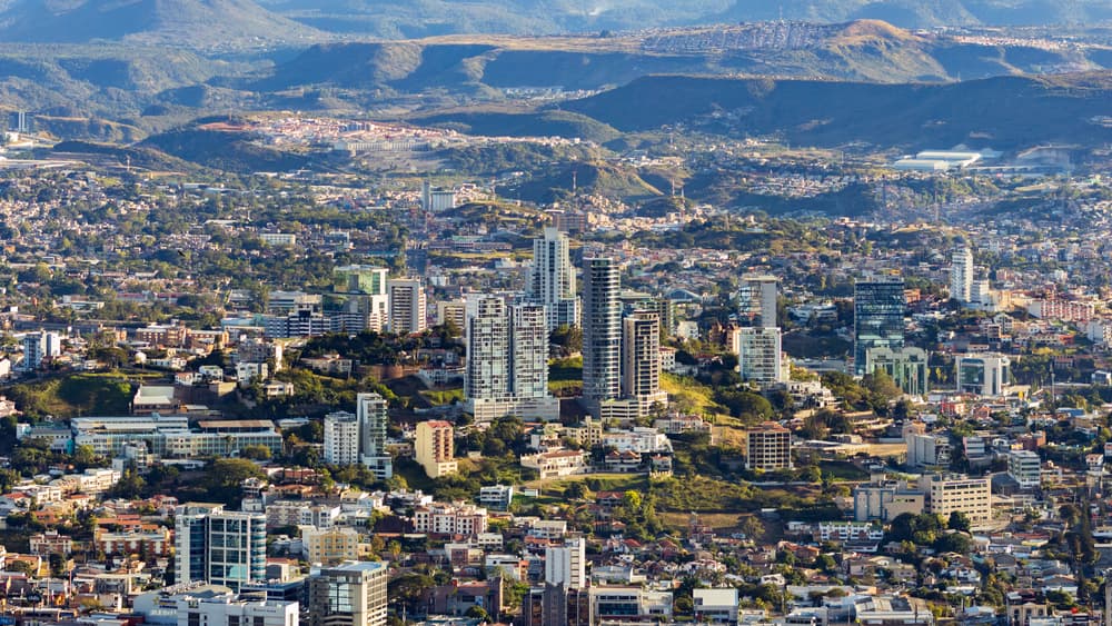 Aerial shot of city spread to horizon, Tegucigalpa