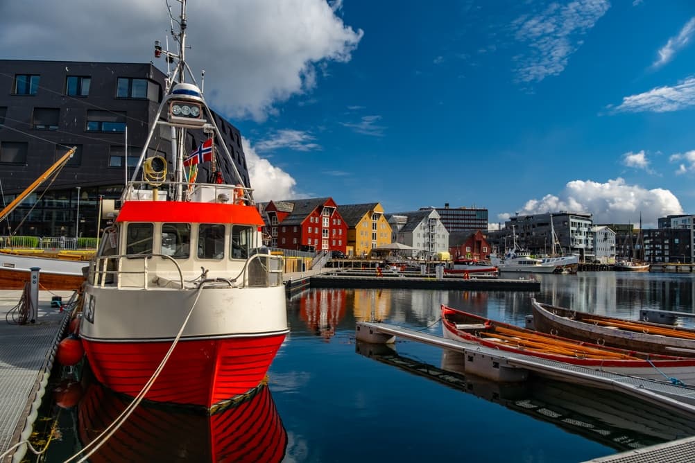 Boats docked in the river on warmer day than most, Tromsø