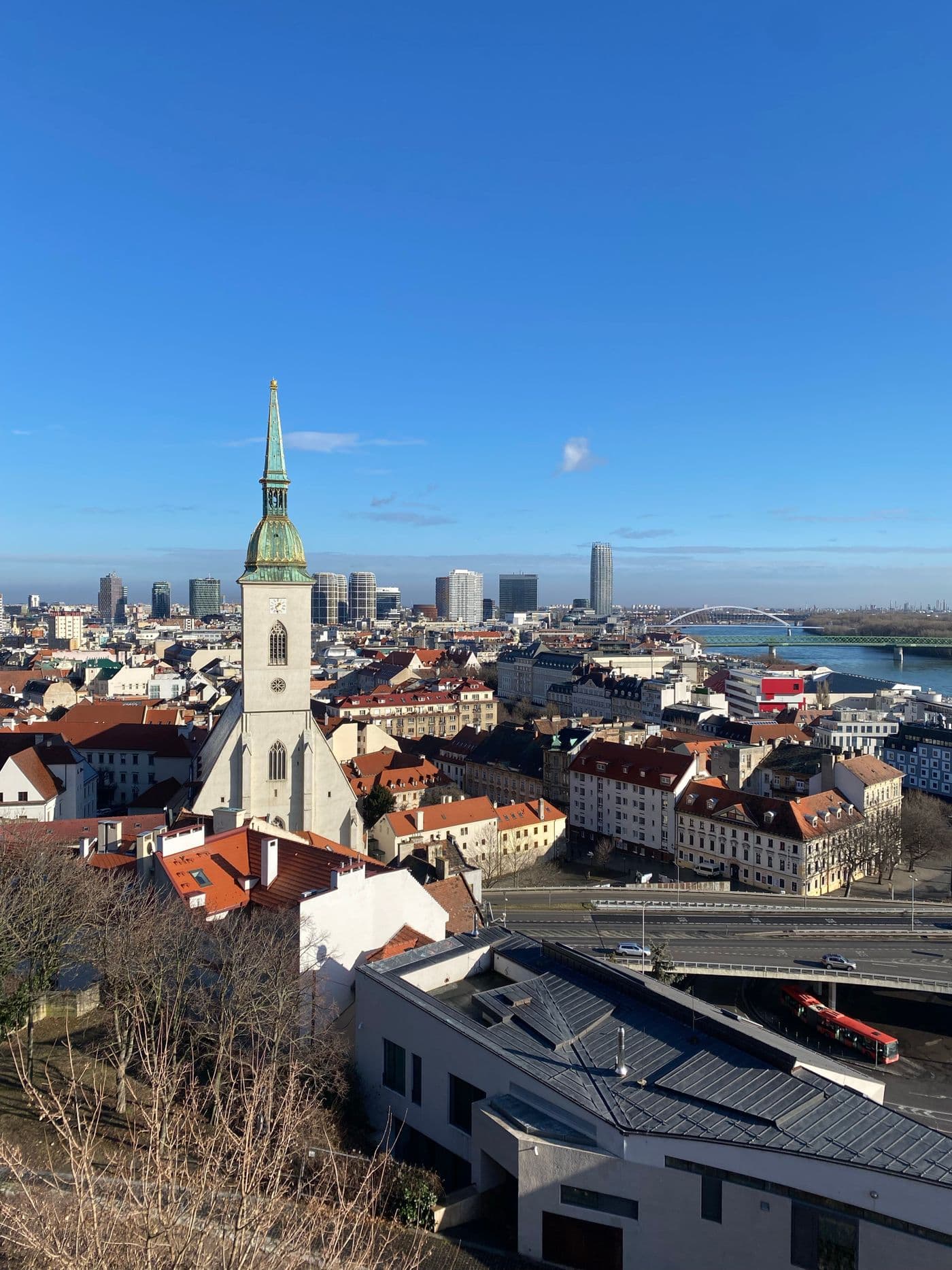 St. Martin's Cathedral and the rooftops of Bratislava's old town under a clear sky