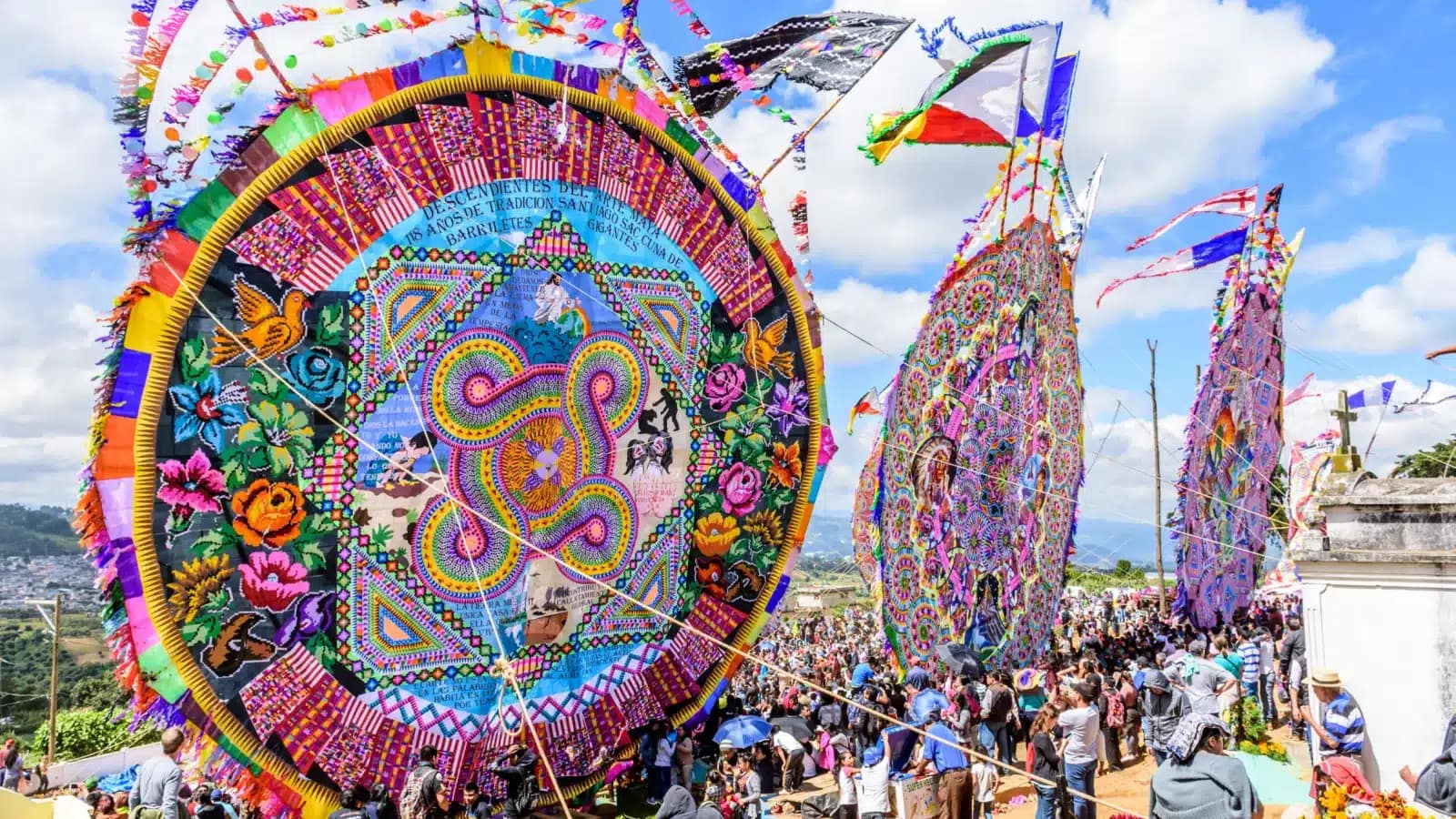 Giant hand-made kites and crowds at the Day of the Dead kite festival in the Guatemalan highlands