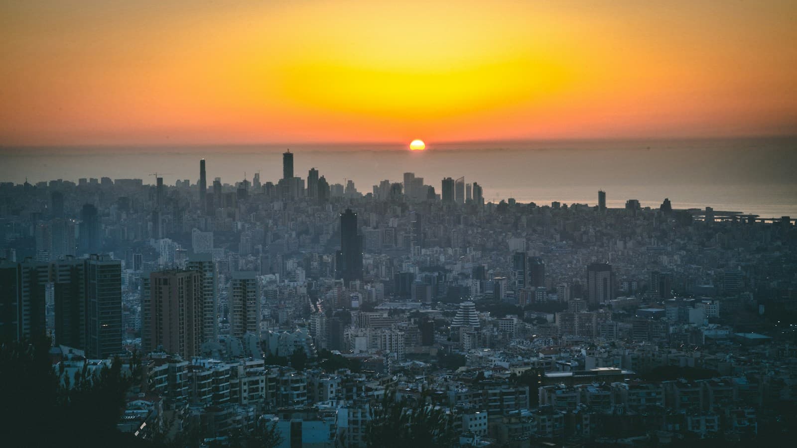 Sunset over the Beirut skyline and the Mediterranean, seen from the hills above the city