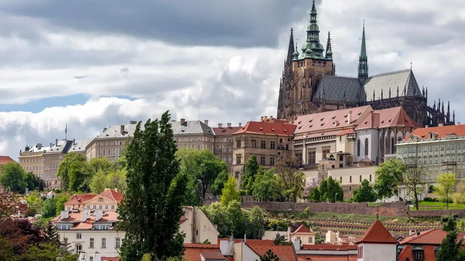 Prague Castle and St. Vitus Cathedral above the red roofs of Malá Strana