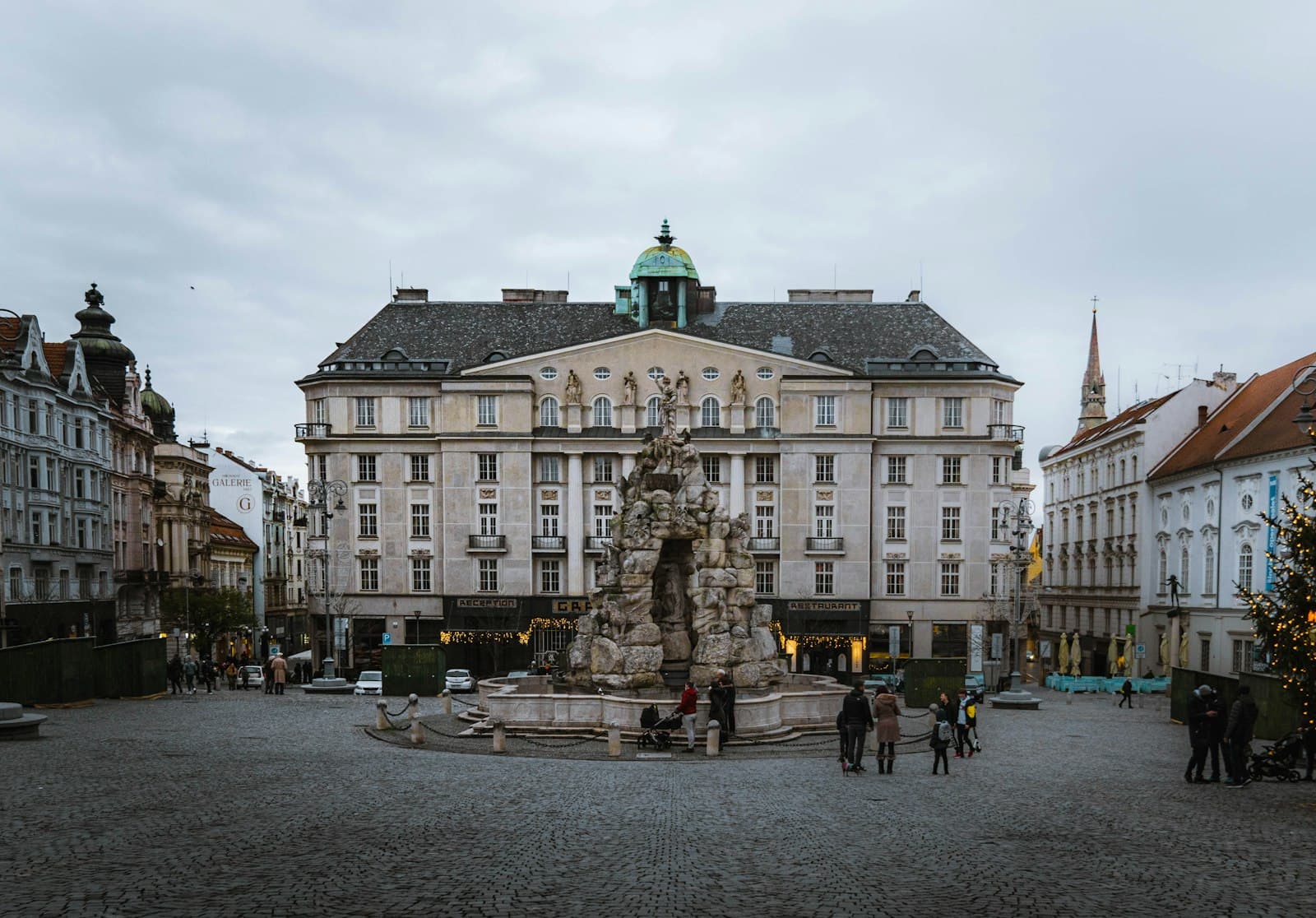 The Parnas fountain and a grand corner building on Brno's Cabbage Market