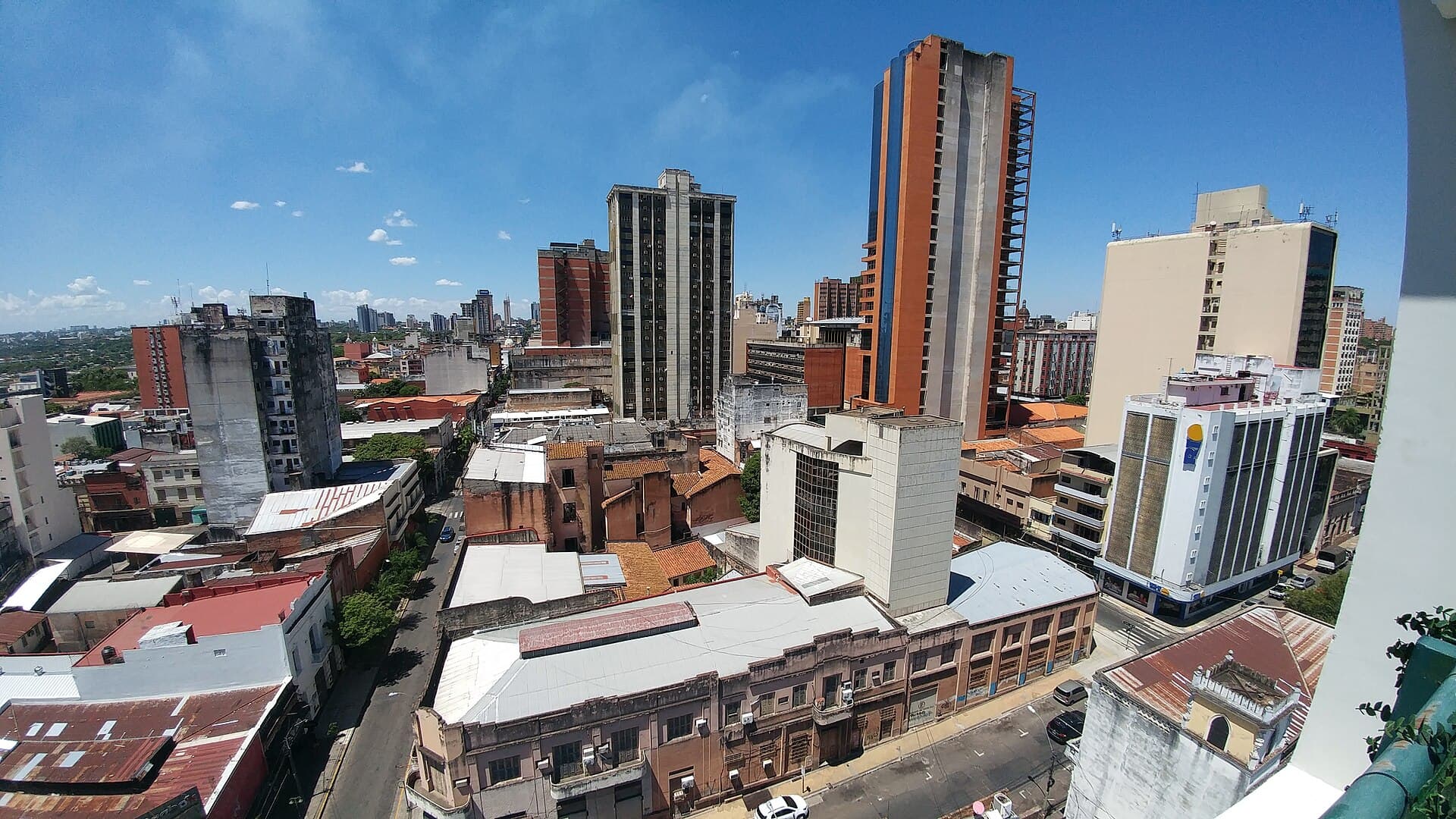 Office towers and older buildings along Calle Palma in downtown Asunción