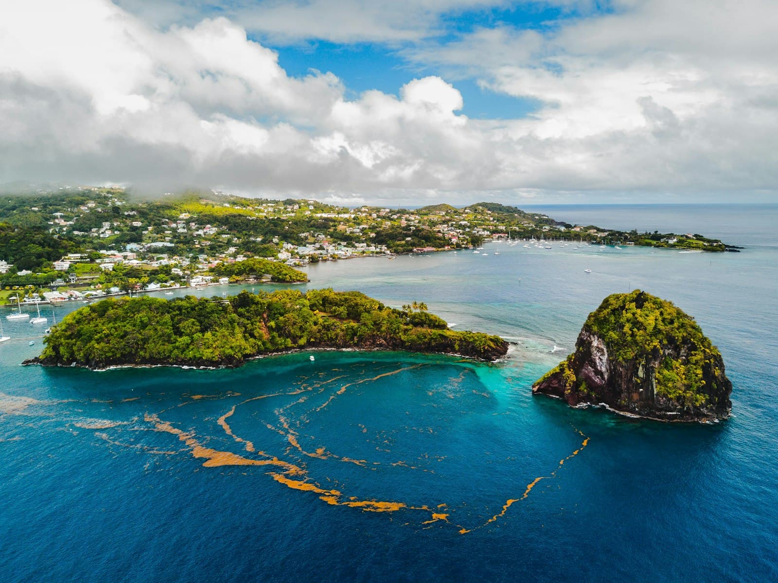 Aerial view of Young Island and the Villa and Calliaqua shoreline on Saint Vincent's south coast
