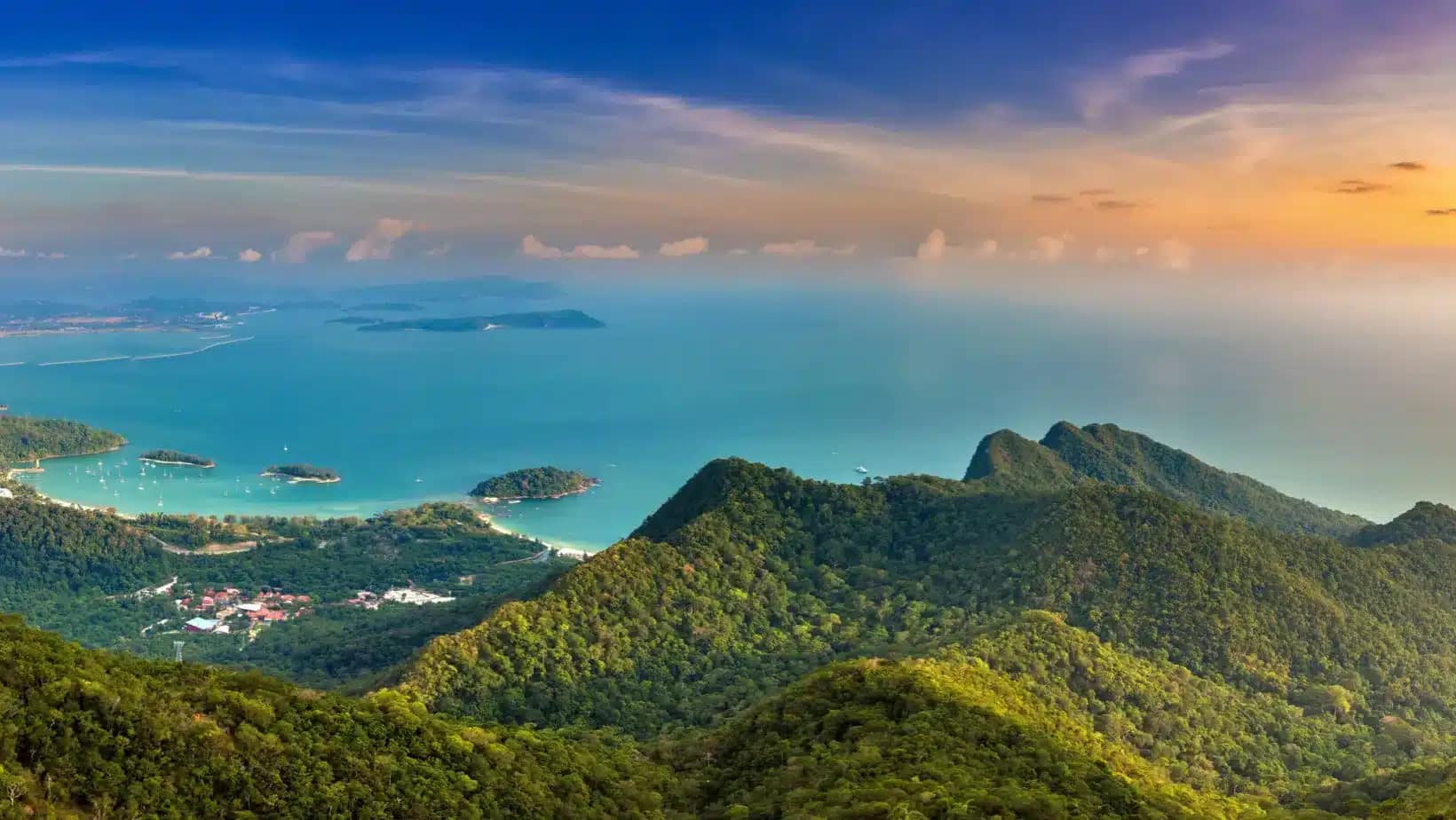 Green hills above turquoise water and small islands at Langkawi, Malaysia