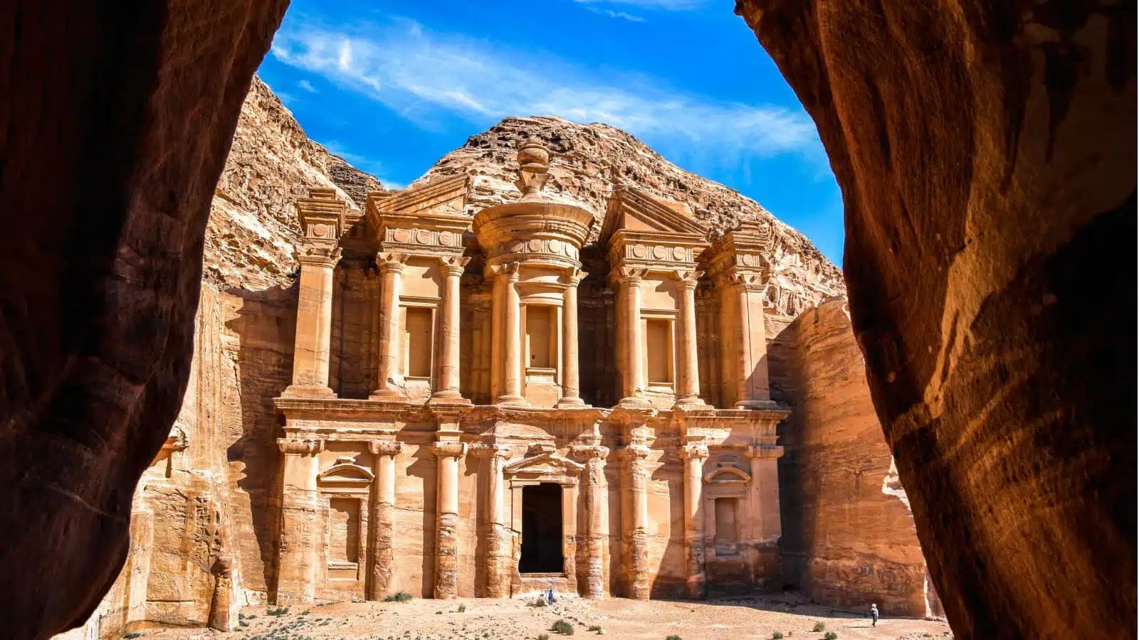 The Monastery at Petra framed by sandstone rock walls