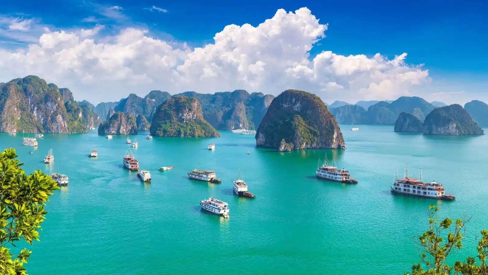 Limestone islands and tour boats in Ha Long Bay, Vietnam