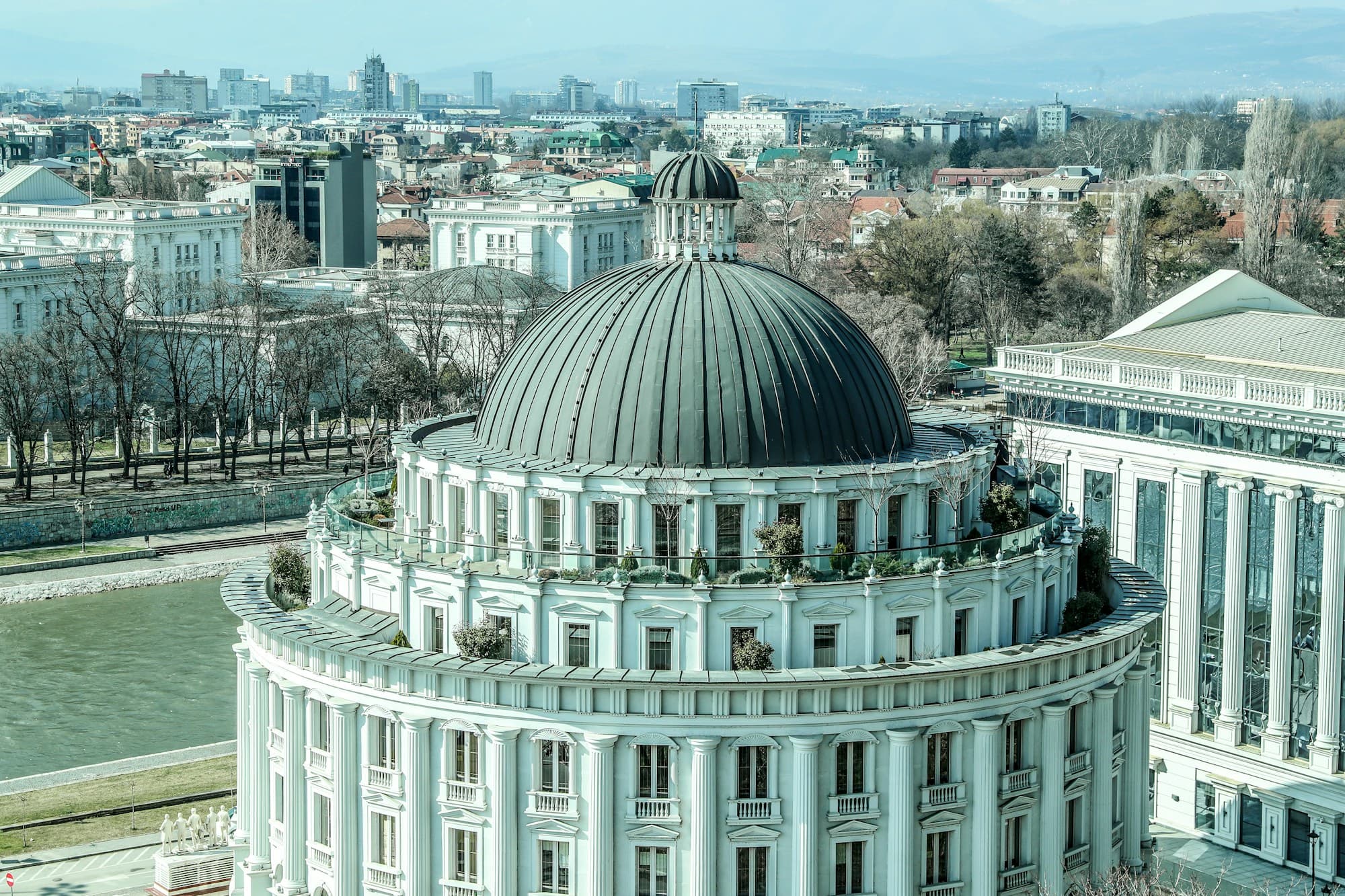 A domed building on the Vardar riverbank in central Skopje