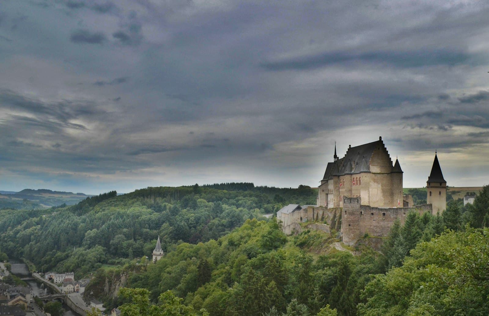 Vianden Castle on a forested ridge above the Our valley in northern Luxembourg