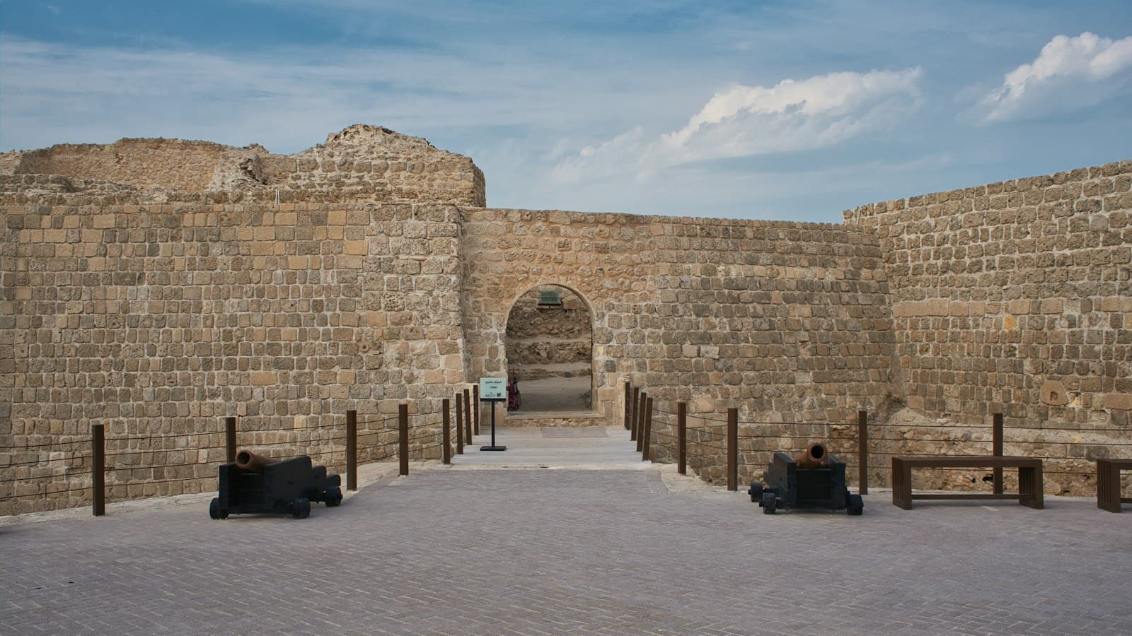 The stone walls and gateway of Qal'at al-Bahrain, the Bahrain Fort