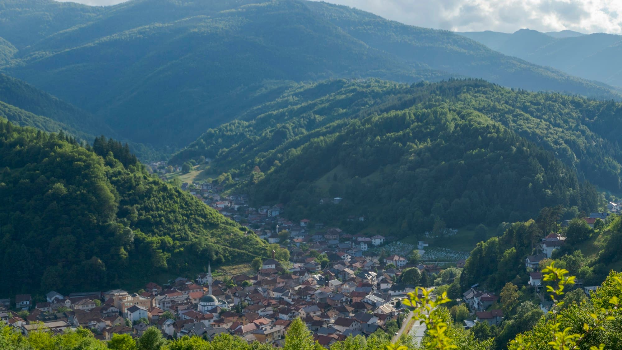A small town in a forested mountain valley in Bosnia and Herzegovina