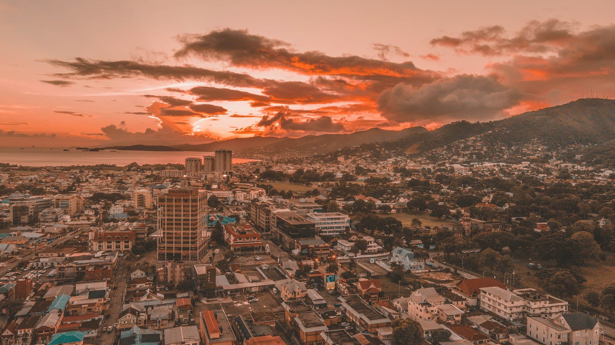Port of Spain skyline at sunset with the Northern Range behind it