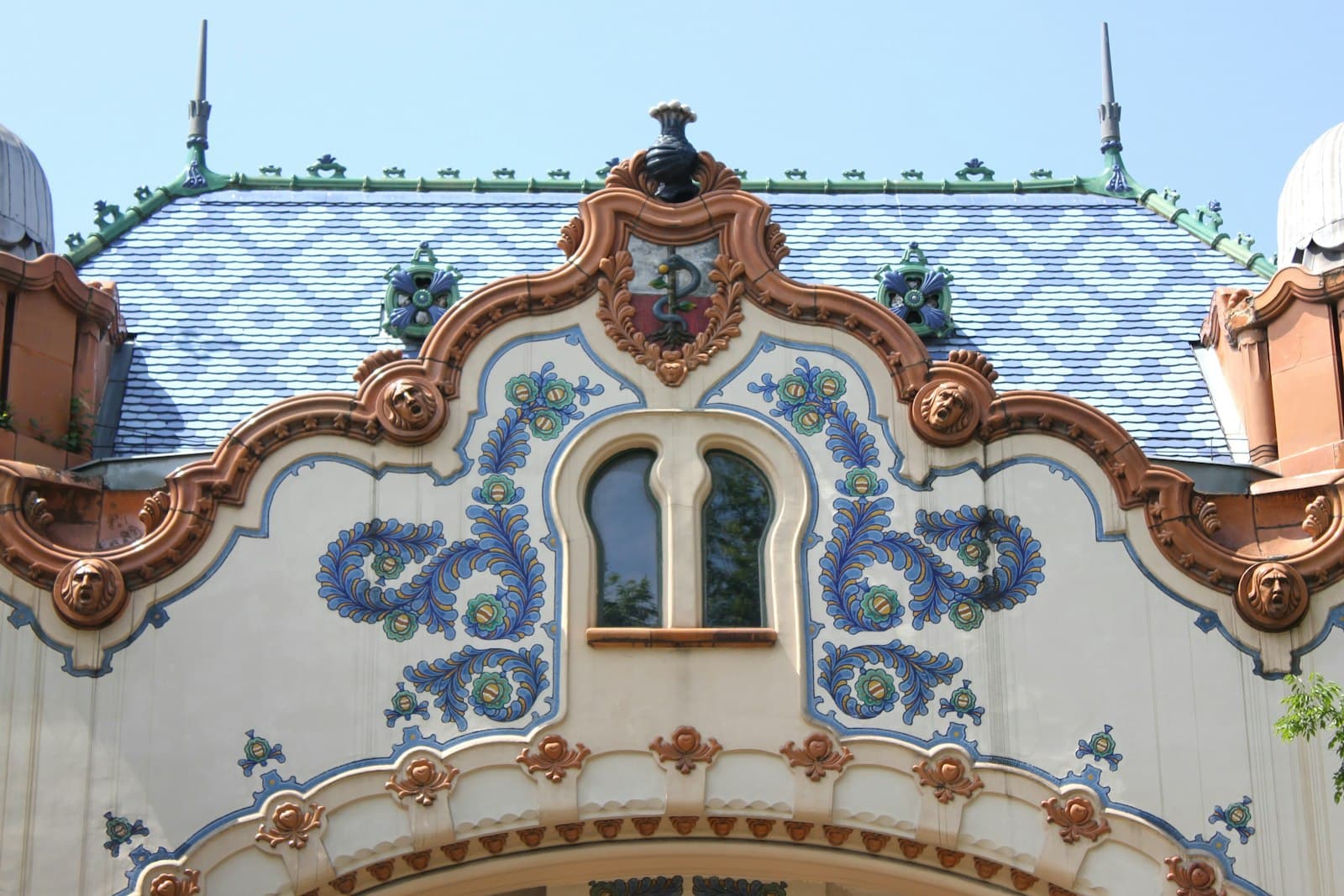Ornate Art Nouveau facade with blue ceramic ornament in Subotica, northern Serbia