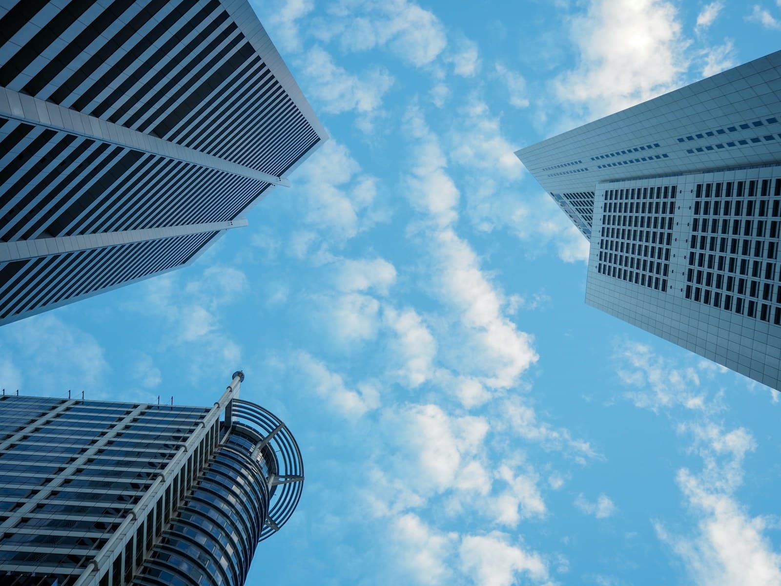 Looking up at office towers in Raffles Place, Singapore's financial district