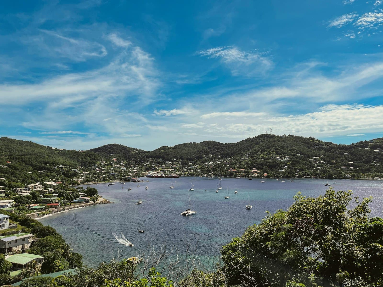 Sailboats anchored in Admiralty Bay below the hillside homes of Port Elizabeth, Bequia