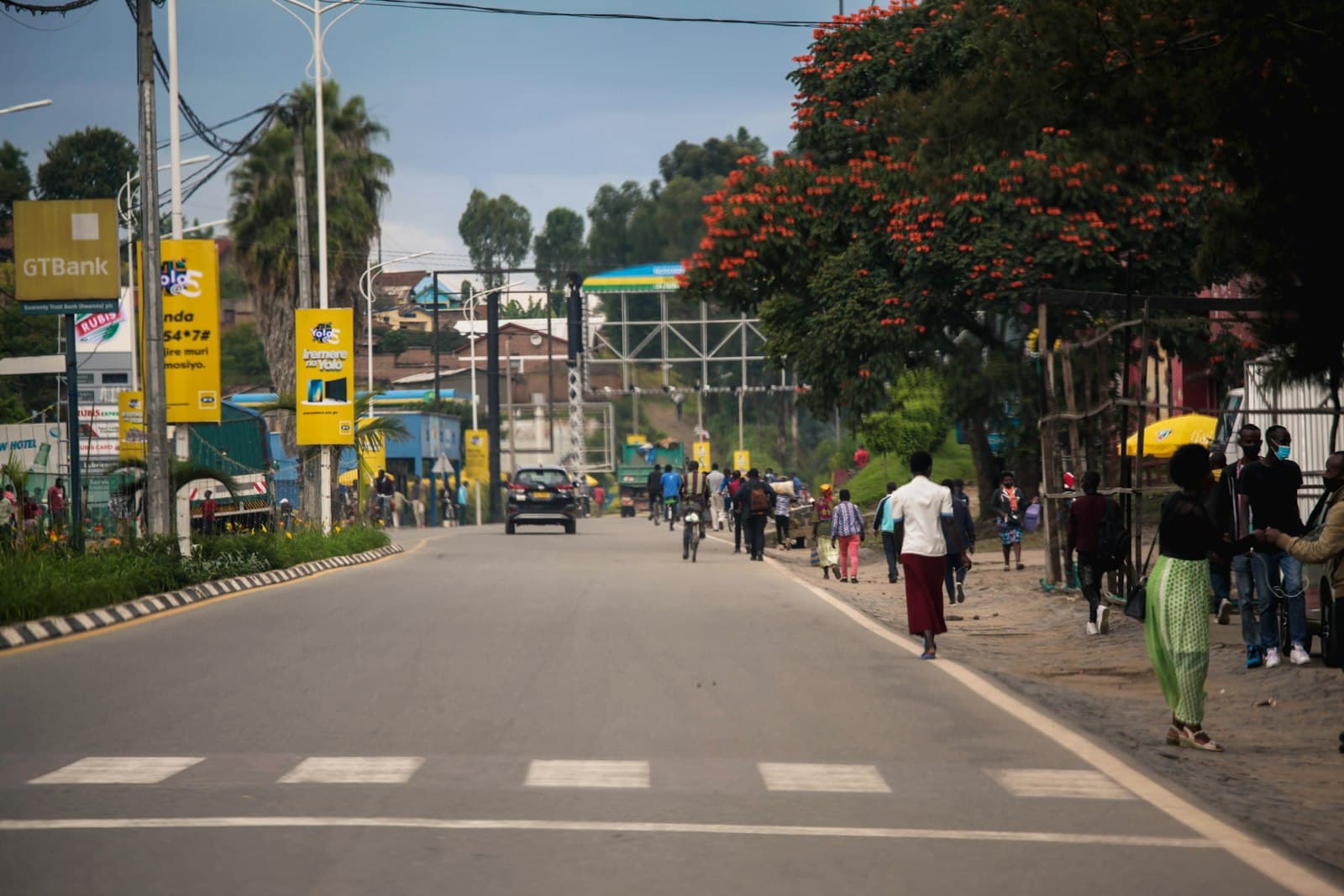 A street in Rwanda lined with bank and mobile money signs